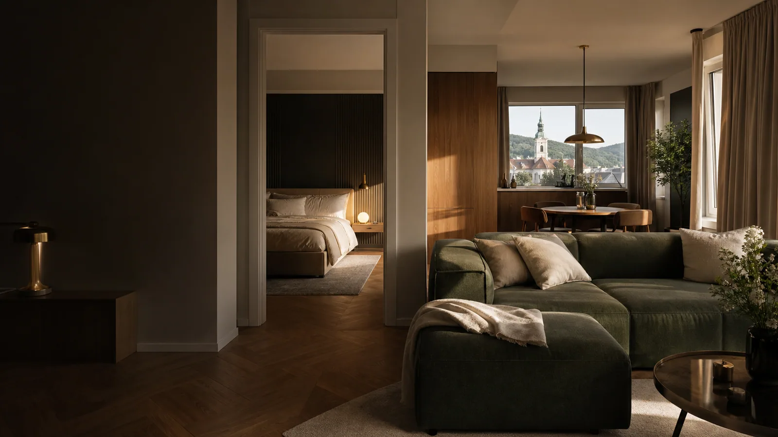 Prepojená obývacia, spálňová a kuchynská časť apartmánu